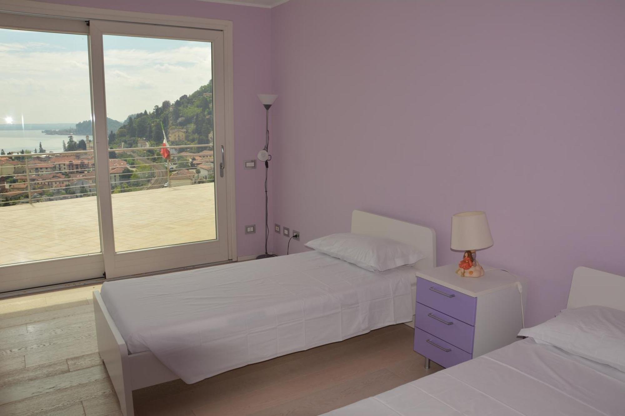 Il Girasole Apartment Meina Phòng bức ảnh