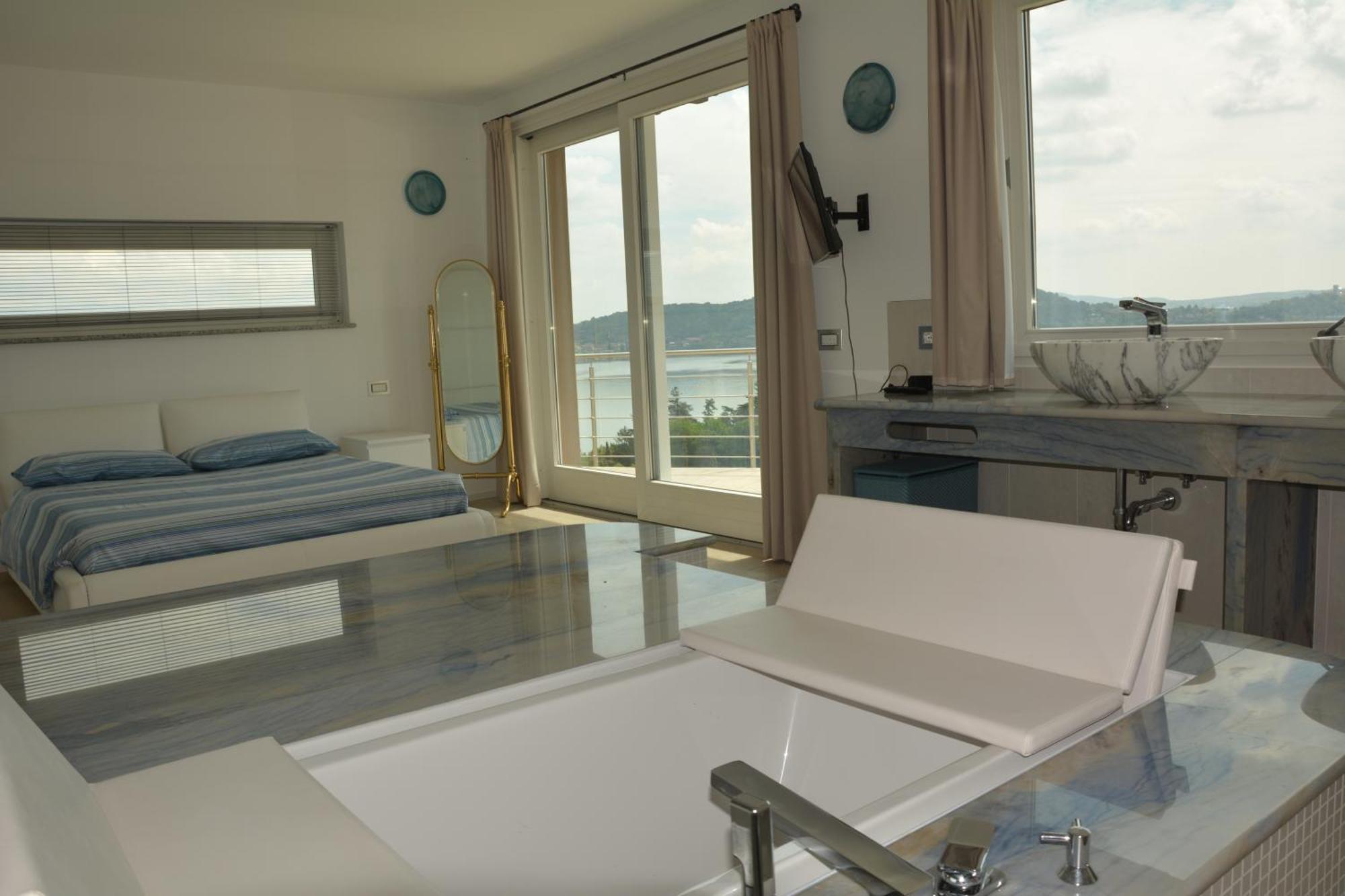 Il Girasole Apartment Meina Phòng bức ảnh